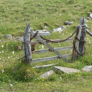 an old gate in a field